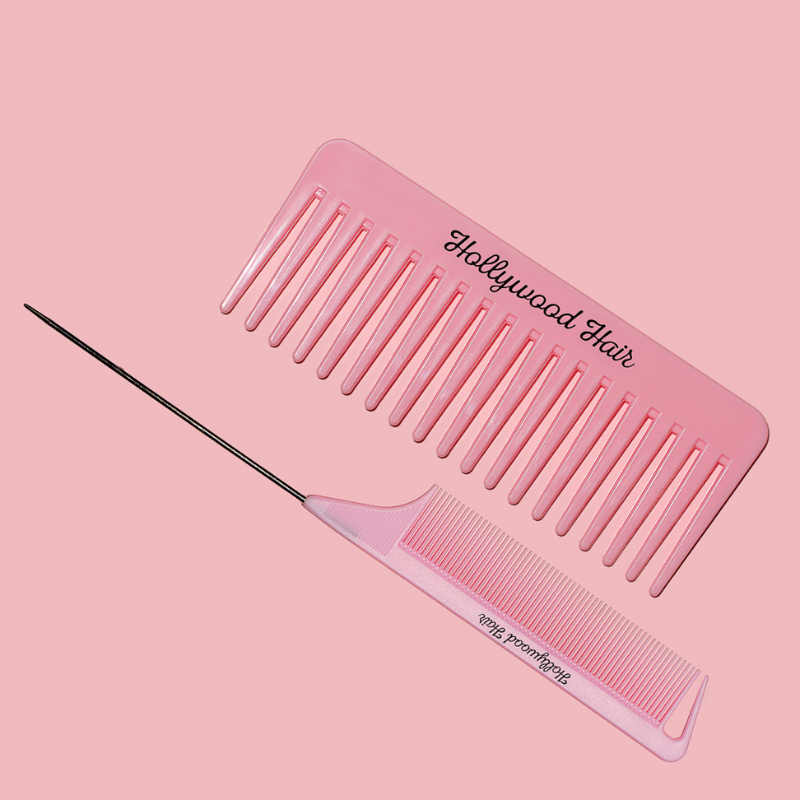 Comb for combing and styling hair with a spike